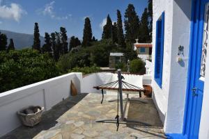 Traditional cycladic house with view in Andros Andros Greece