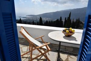 Traditional cycladic house with view in Andros Andros Greece