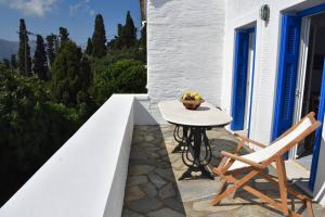 Traditional cycladic house with view in Andros Andros Greece