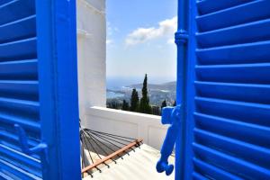 Traditional cycladic house with view in Andros Andros Greece