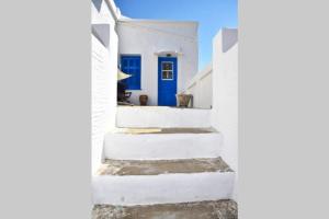 Traditional cycladic house with view in Andros Andros Greece