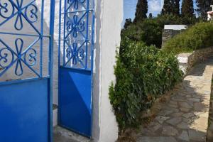 Traditional cycladic house with view in Andros Andros Greece