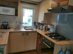 Campings Assist' Mobil Home 276 - Mobil home 3 chambres au calme : photos des chambres