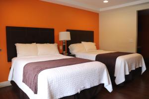 Superior Room with Two Double Beds room in Curtis Inn & Suites