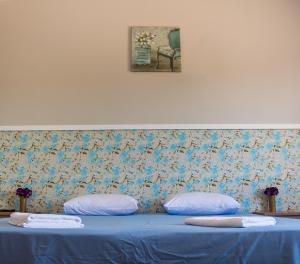 Pouso Oliveira Suítes