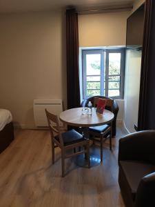 Appart'hotels L'Hotellerie de la Toile a Beurre : photos des chambres