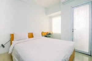 Modern Style Studio Tamansari Mahogany Karawang Apartment with City View By Travelio - Badami