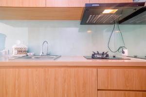 Modern Style Studio Tamansari Mahogany Karawang Apartment with City View By Travelio