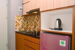 Comfortable Studio Grand Kamala Lagoon Apartment By Travelio