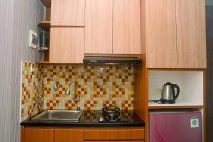 Comfortable Studio Grand Kamala Lagoon Apartment By Travelio