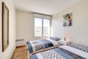 Appartements Chic apart with parking and balcony : photos des chambres