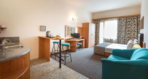 Studio with Balcony (3 Adults+ 1 Child)  room in Hotel Lotus