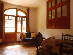 Appartements Charmant appartement sur cour, Le Berlingott : photos des chambres