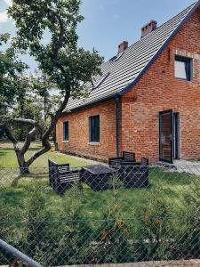 Apartamenty Dom Ogrodnika - Ubytování bez kategorie ve městě Białogóra