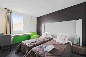 Hotels Campanile Roissy - Aeroport CDG - Le Mesnil Amelot : photos des chambres