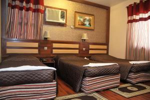 Deluxe Quadruple Room room in Downtown Hotel