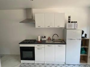 Appartements Detente sous les Cotes baignoire balneo : photos des chambres