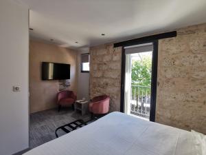 Hotels Hotel de la Couronne : photos des chambres