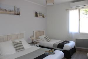 Hotels Le Heron Cendre : Chambre Triple