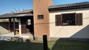 Casa bege Bal Arroio do Silva com internet