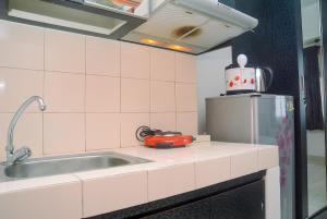 Good Homey and Simply Studio Margonda Residence 3 Apartment By Travelio