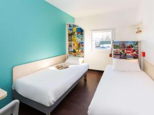 Hotels hotelF1 Nancy Sud : photos des chambres