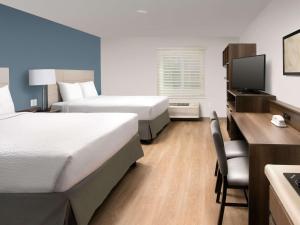 Double Room with Two Double Beds - Smoking room in WoodSpring Suites Albuquerque