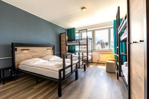 Bed in 6-Bed Dormitory Room room in a&o München Laim