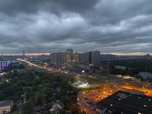 Two-Bedroom Apartment with Balcony room in Apartments with Dnipro view