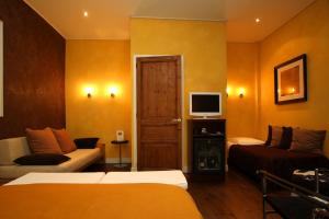 Hotels Hotel des Arceaux : photos des chambres