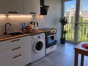 CENTRUM PANORAMA STUDIO Złota 81 Street Warsaw by Gi4