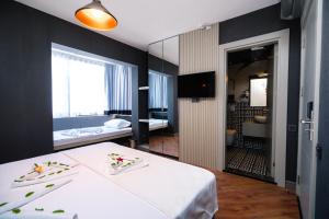 Deluxe Room (2 Adults + 1 Child) room in Basel Hotel