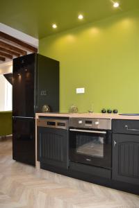 Appartements Maison 1747 - Gites de Standing en Vieille-ville avec Cour : photos des chambres