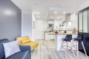 Appartements J-Mo Home - Magny - Moderne et chaleureux : photos des chambres