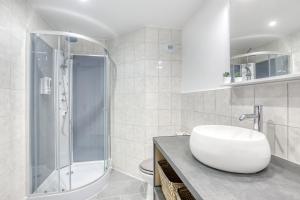 Appartements J-Mo Home - Magny - Moderne et chaleureux : photos des chambres