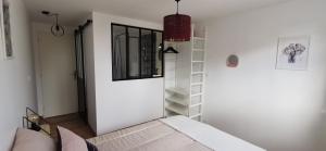 Appartements Les Pensees - Proche Loire et Orleans - Appartement Standing : photos des chambres