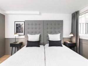 Appartements LivinParis - Luxury 3 Bedrooms Arc de Triomphe I : photos des chambres