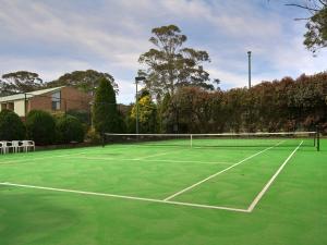 Bay Parklands 57 ground floor unit with pool tennis court and aircon