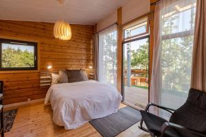 Appartements Koteja Nature - Location au charme nordique en Ardeche - studio et appartement : photos des chambres