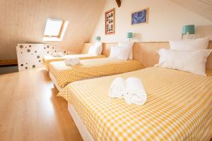 Appartements Schriner Huss - Chambres d'hotes & Gites : photos des chambres