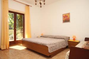Two-Bedroom Apartment with Terrace room in Apartments with a parking space Basanija Umag - 7149