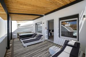 Deluxe Triple Room with Side Sea View and Outdoor Jacuzzi