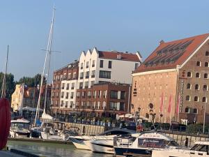 Apartamenty Centrum nad Motławą z widokiem na rzekę lub na patio z balkonem