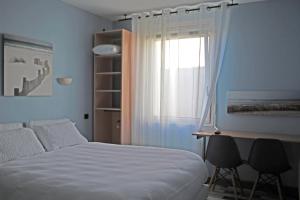 Hotels Contact HOTEL LES TERRASSES : photos des chambres