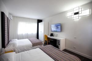 Quadruple Room room in Hotel La Compagnia Del Viaggiatore