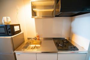 Hotel Tomas Asahibashi Station