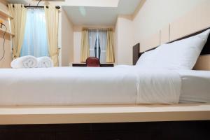 Cozy Studio Room Grand Dhika Apartment By Travelio