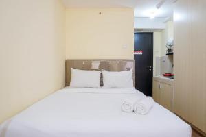 Comfy Studio Apartment at Belmont Residence Puri By Travelio