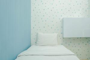 Best Comfy and Modern 2BR Green Pramuka Apartment By Travelio