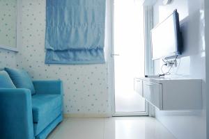 Best Comfy and Modern 2BR Green Pramuka Apartment By Travelio